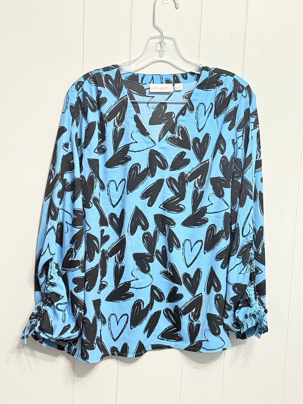 #7)  belle Kim Gravel Blue Heart-Print Long Sleeve Top with Cute Sleeve detail